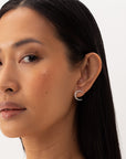 luna single earring, silver stud earring, 925 silver earrings, rhodium plated, moon shape, hypoallergenic, close-up