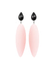 Nymphe stud earrings, pink rubber, sterling silver, pear shaped rosewood, white background.
